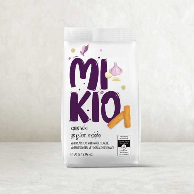 MIKIO Bites snack packaging design with bold colors and playful branding for youth appeal by leoussis a_